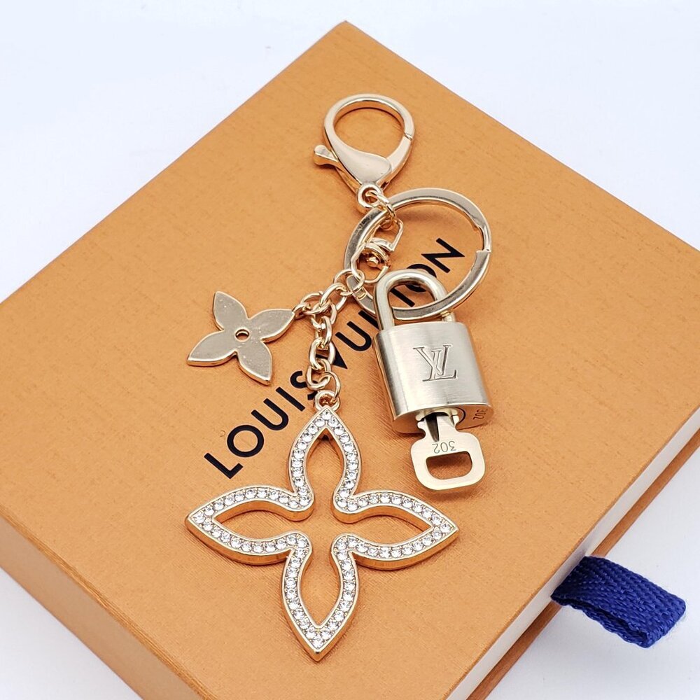 Authentic Louis Vuitton Gold Lock & Box w/ Unbranded Clover Bagcharm - Picture 2 of 9